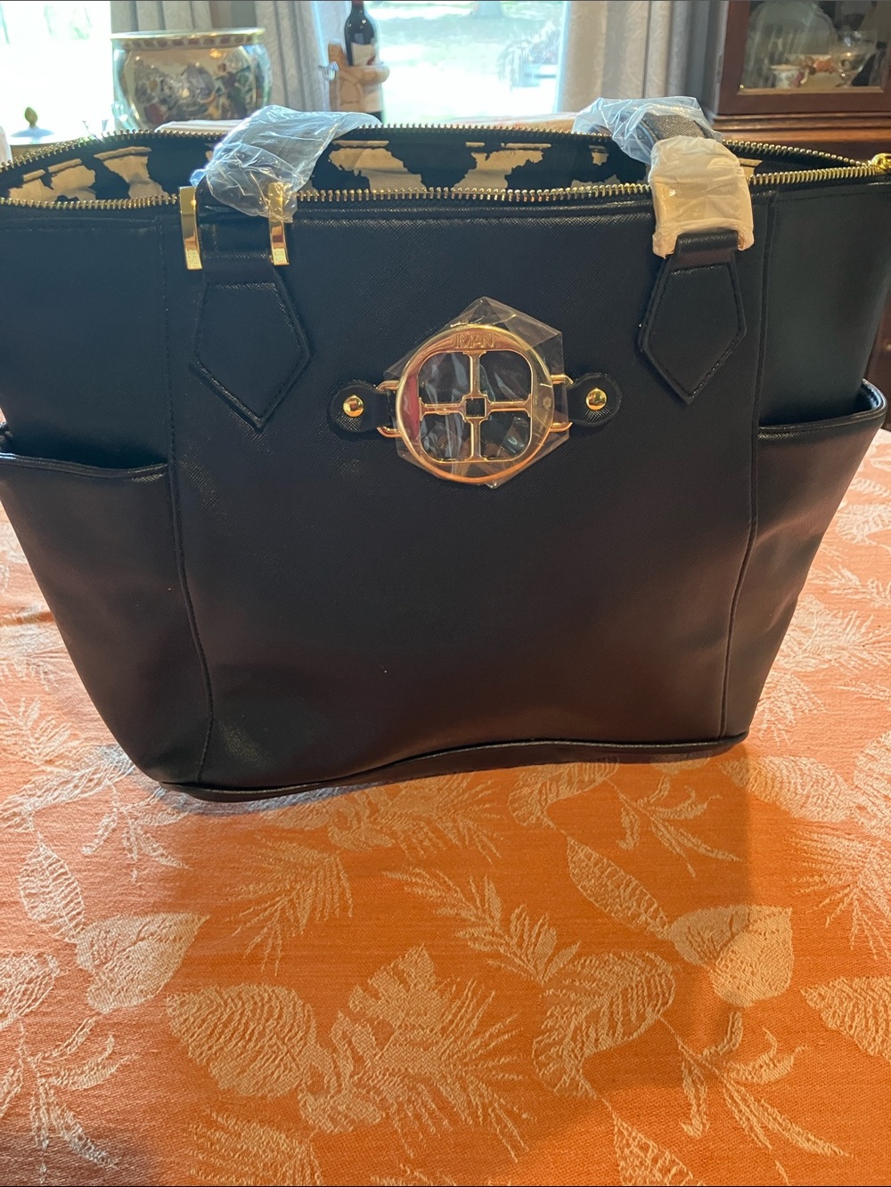 IMAN Black Tote with Gold Emblem